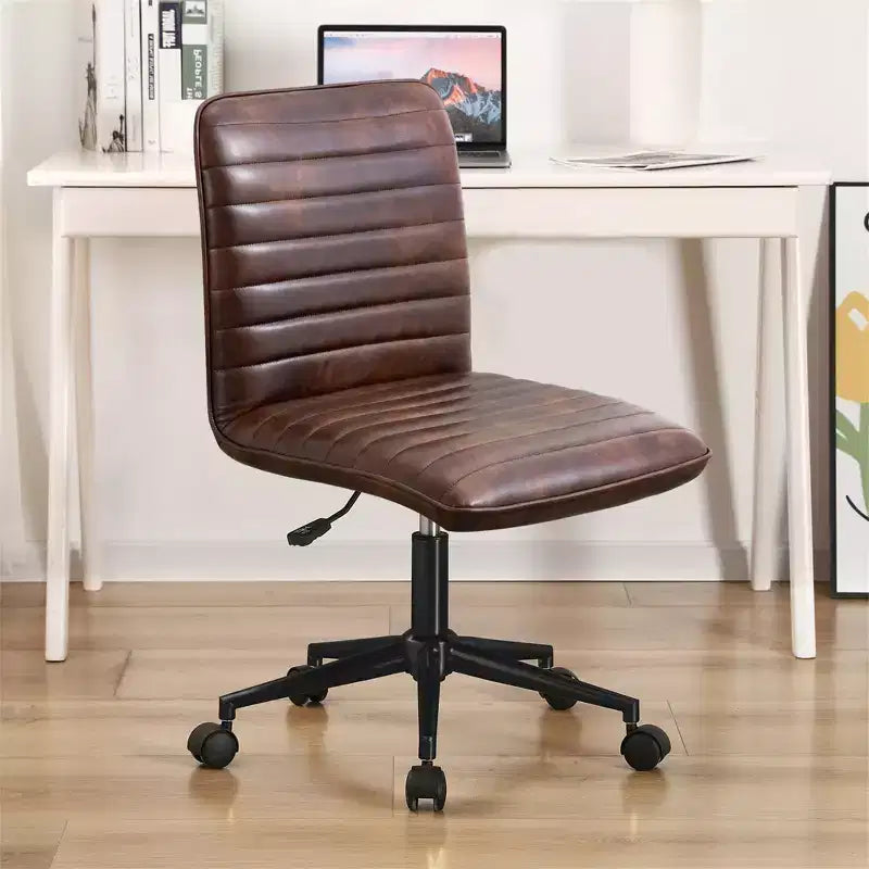 Chaise de bureau sans accoudoirs en similicuir, dossier mi-hauteur, pivotante à 360°, réglable